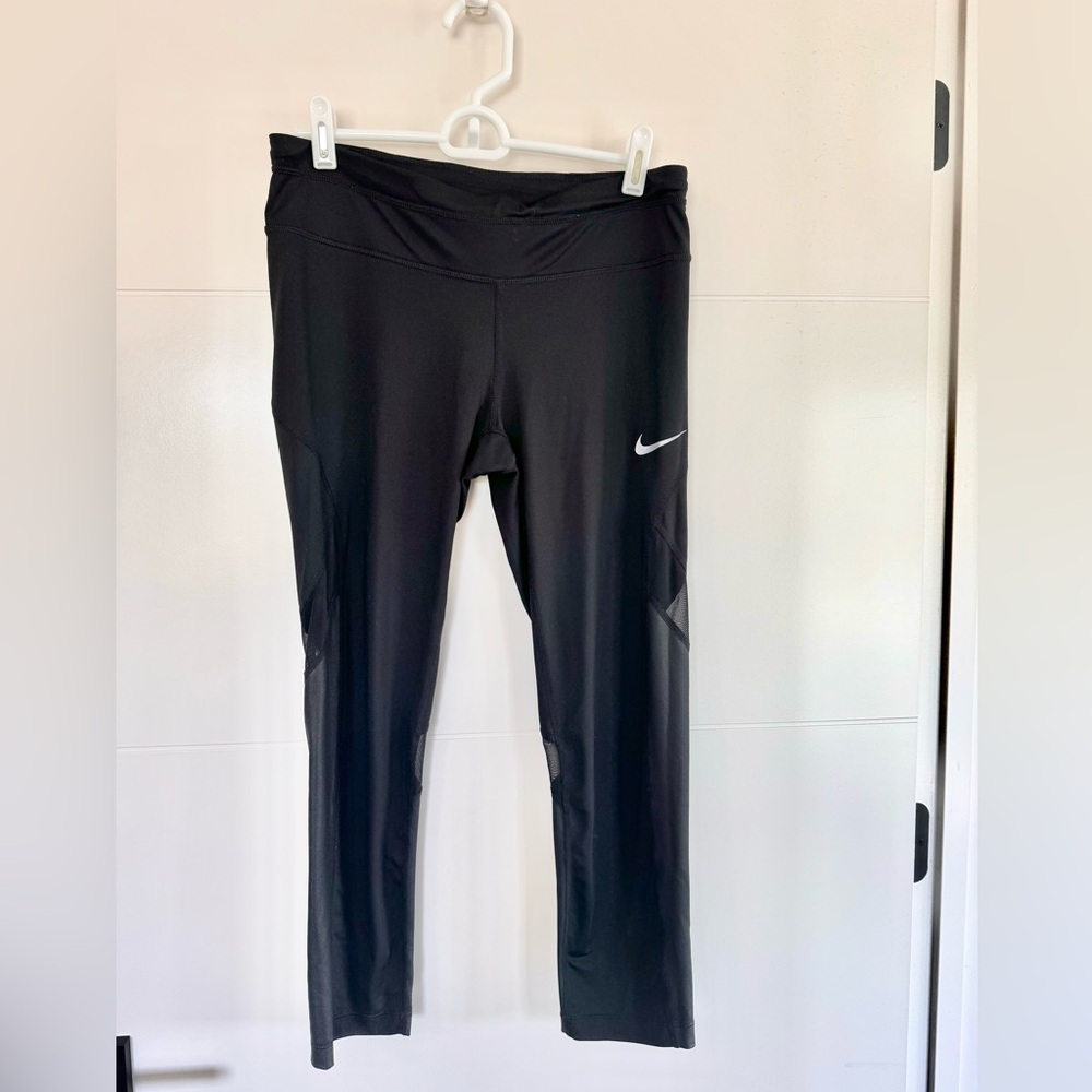 Nike dri fit black tights with mesh panels